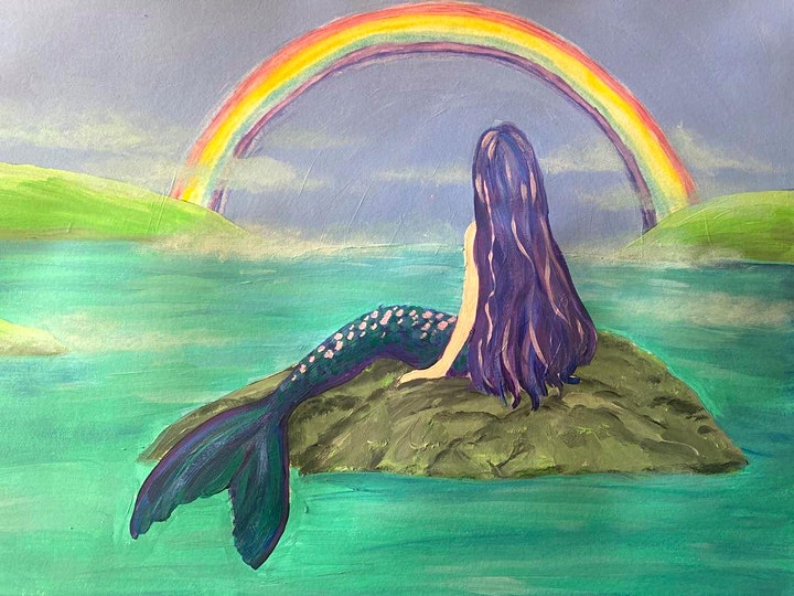 mermaid on rock with a rainbow in the distance