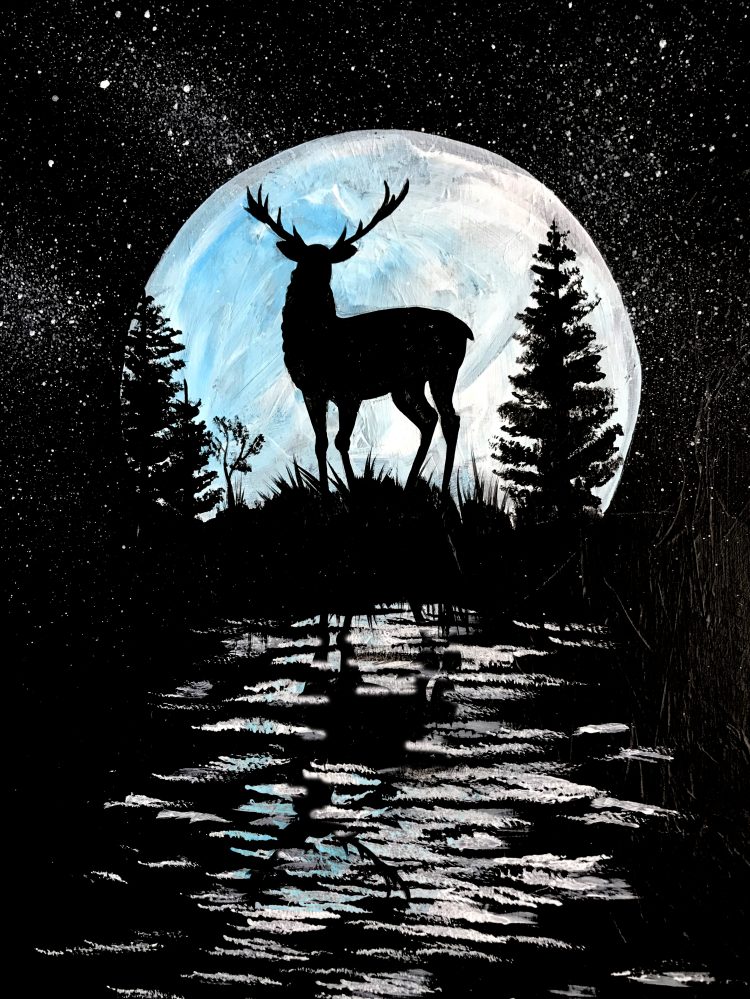 deer silhouetted against moon