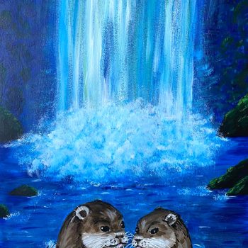 two otters in a waterfall